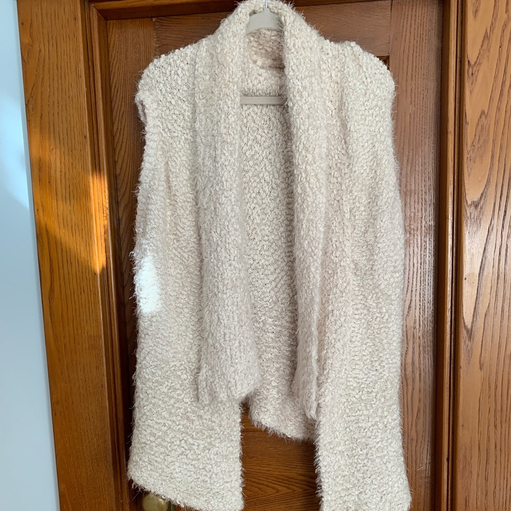 Cozy sweater vest worn once. Cream/oatmeal color. One size